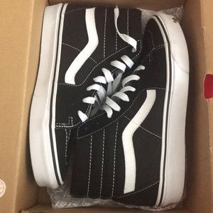 black and white high top vans